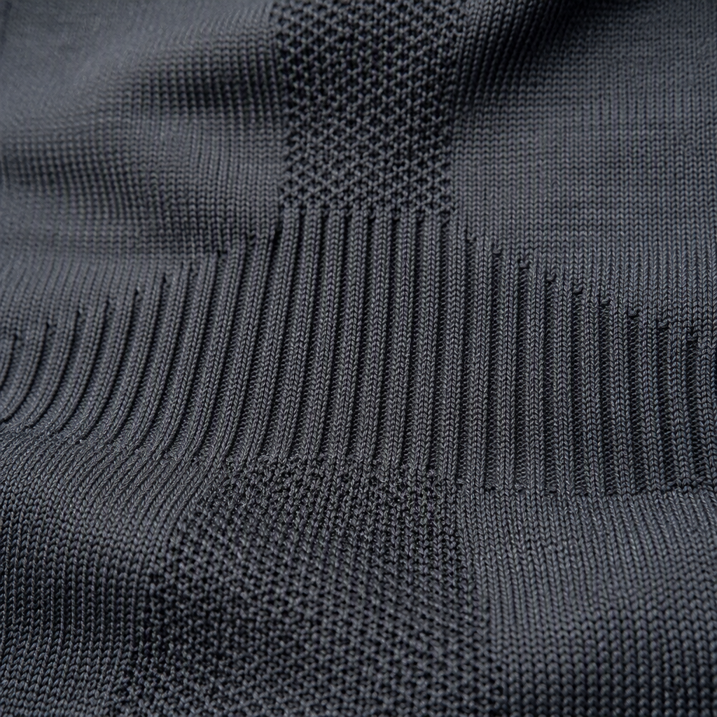 Seamless knit athletic fabric — engineered ribbed texture close-up
