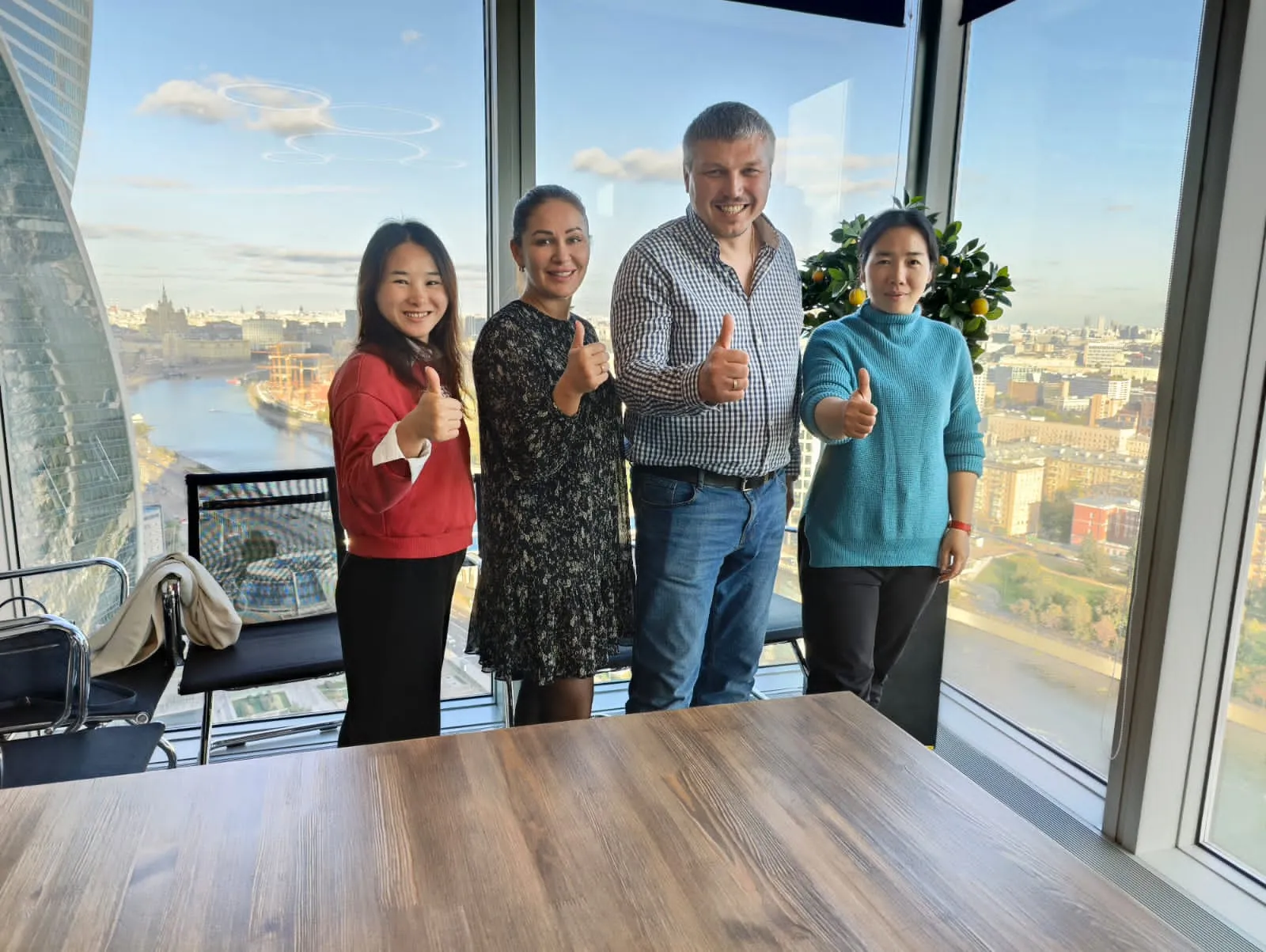 The Kingben Sports team sharing insights from the office